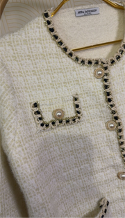 Veste en laine avec dorée